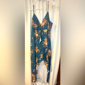 High low dress. Floral with a tie in back … Worn once